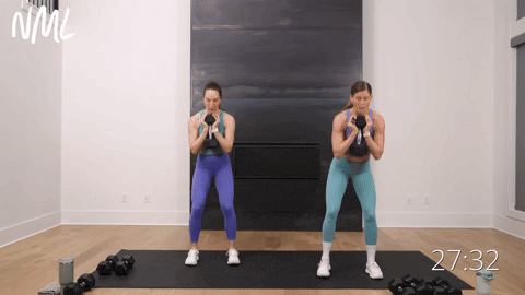 two women performing goblet squats and staggered squats in a full body workout