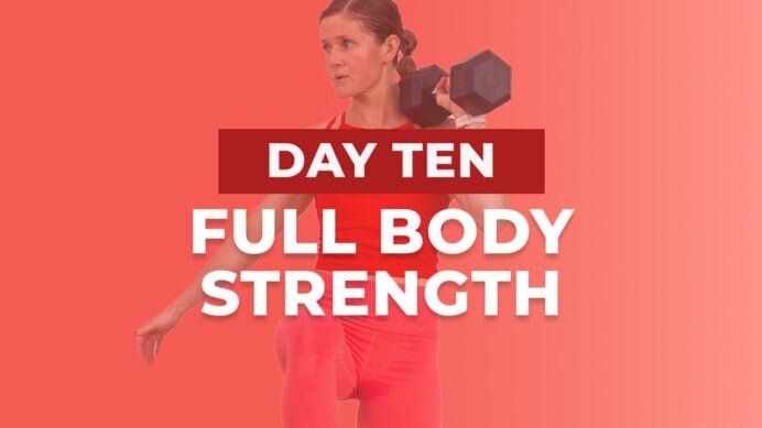 woman performing dumbbell snatch as part of muscle building workout