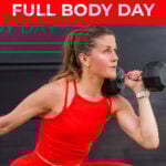 woman performing squat thruster