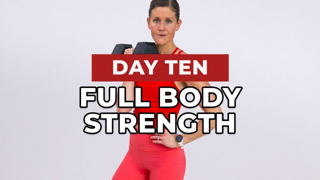 woman performing dumbbell snatch as part of muscle building workout